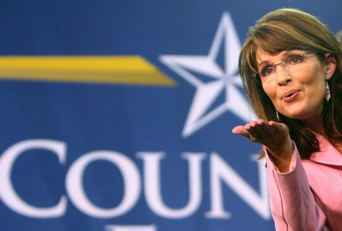 Alaska Gov. Sarah Palin blows a kiss in Kissimmee, Fla., during a campaign stop in October 2008. (File Associated Press / The Spokesman-Review)