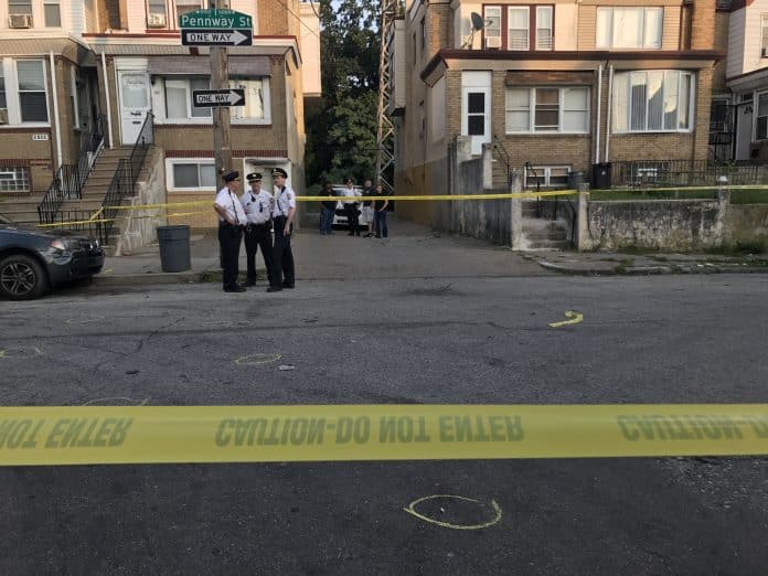 Police & crime scene investigators on the scene of an execution-style murder on the 5100 block of Pennway St. in Philadelphia Wednesday evening. (PHOTO: YC.NEWS/NIK HATZIEFSTATHIOU)