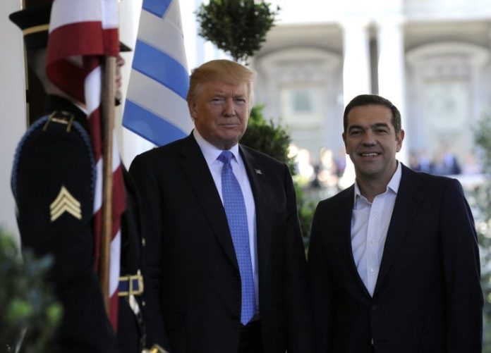 US President Donald Trump (L) welcomes Greek Prime Minister Alexis Tsipras to the White House White House in Washington, DC on October 17, 2017 in Washington, DC. (JASON CONNOLLY/AFP/Getty Images)