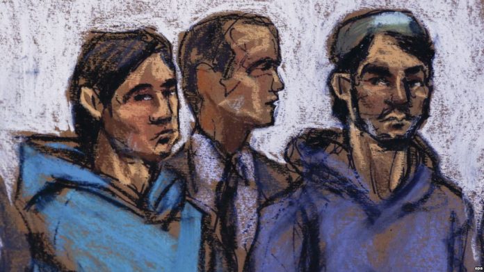 courtroom sketch shows Akhror Saidakhmetov (left), 19, of Kazakhstan and Abdurasul Hasanovich Juraboev (right), 24, of Uzbekistan, and court interpreter Akhror Saidakmetov appear in the Federal District Courthouse in New York in February 2015.
