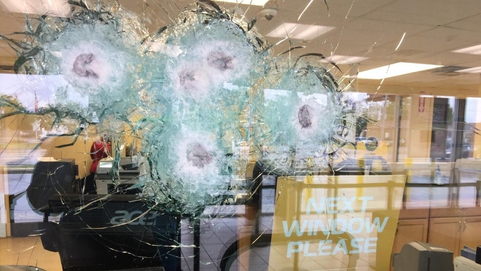 A clerk at a West Broad Street business is thankful for the bullet-proof glass that absorbed shots fired at her. (WSYX/WTTE)