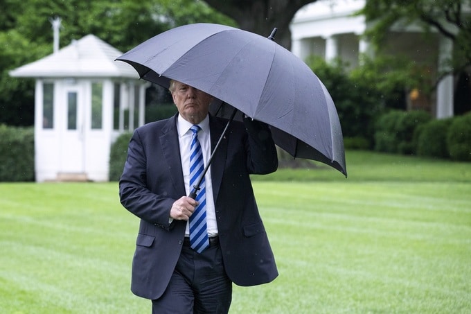 President Donald J. Trump walks along the South Lawn at the White House, in Washington, D.C., Wednesday, May 16, 2018, and boards Marine One en route to Walter Reed Military Medical Center, in Bethesda, MD. (Official White House Photo by Andrea Hanks)