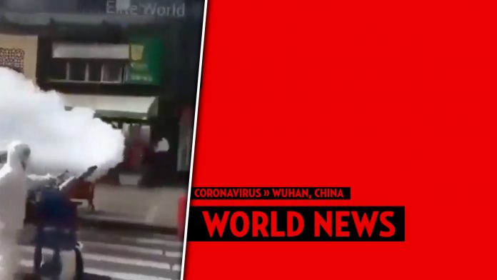 Watch Chinese hazmat officials spray down the entire country to 'fight' coronavirus