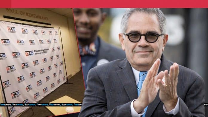 Philly DA Krasner covers up ENTIRE wall of fallen police officers with election backdrop for press conference