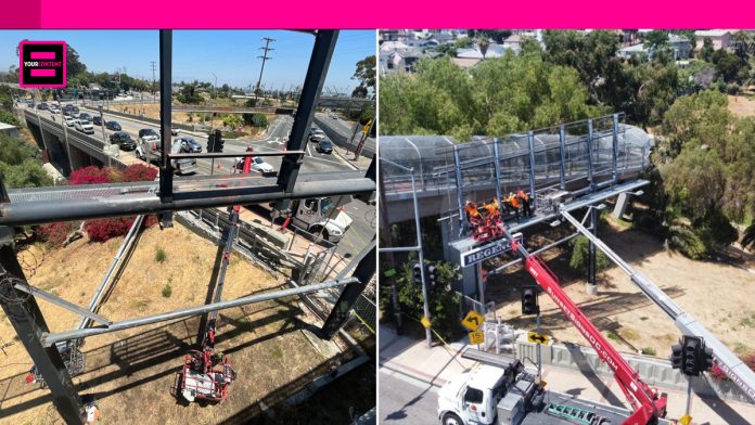 Construction crane overturns during billboard removal in San Pedro, injuring two workers.